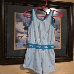 Nike Light Blue Kids One-Piece Romper with Multicolor Swooshes